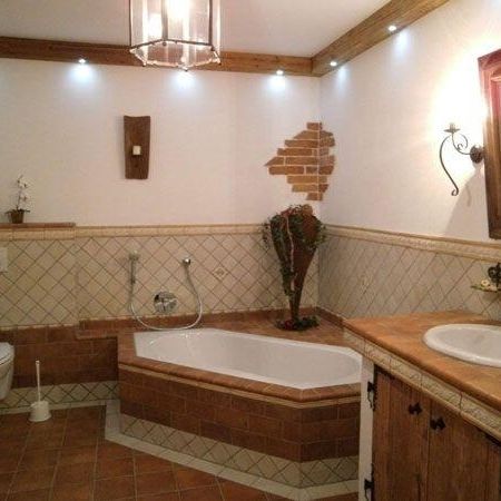 Rustic corner bathtub